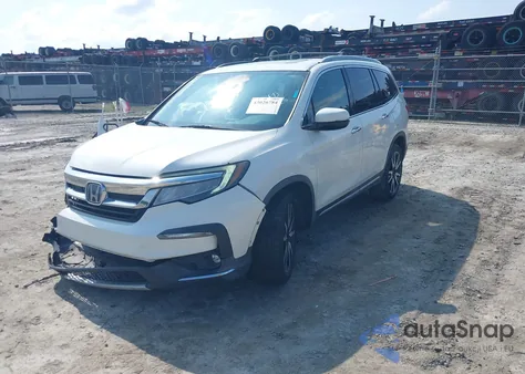 2019 Honda Pilot Touring z USA, uszkodzony, nr VIN 5FNYF5H9XKB001842